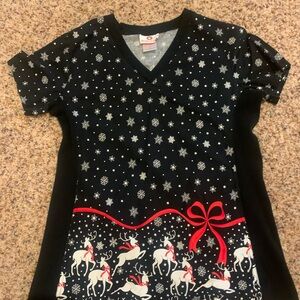 Festive Reindeer and Snowflake Scrub Top by white cross